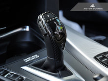 Load image into Gallery viewer, AutoTecknic Carbon Fiber Gear Selector Cover - BMW Sport Automatic Transmission Equipped Only